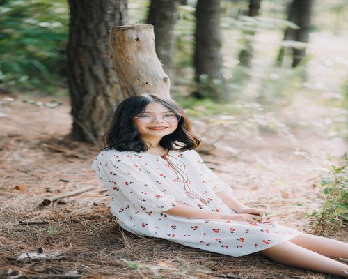 Middle aged couple jogging in a park smiling